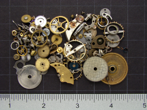 Etsy shop listings of mixed vintage brass gears and watch parts