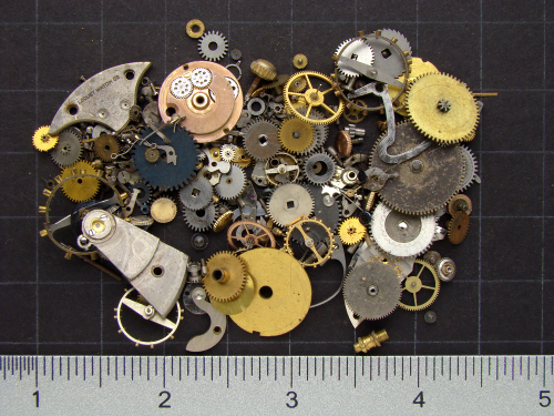 Etsy shop listings of mixed vintage brass gears and watch parts
